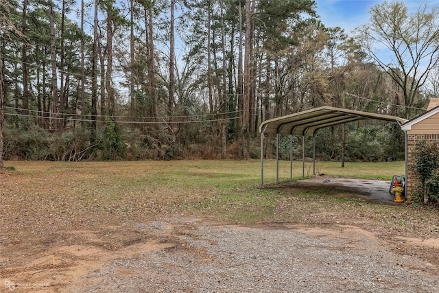 view of yard featuring a carport