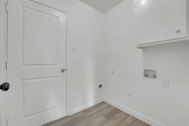 laundry area with hookup for a washing machine, light wood-style flooring, electric dryer hookup, laundry area, and baseboards