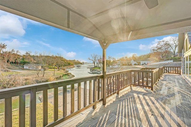 wooden terrace with a water view