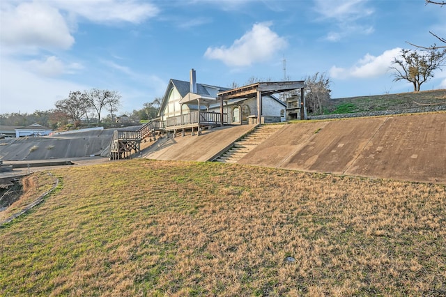 view of yard featuring a wooden deck