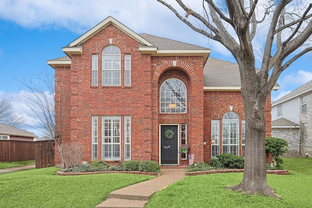 view of property with a front lawn