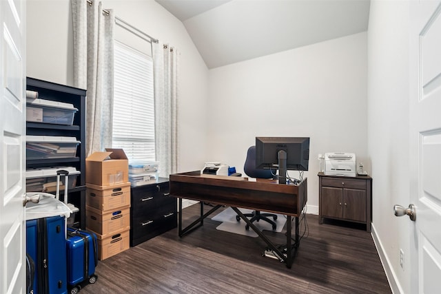 home office featuring vaulted ceiling, baseboards, and dark wood finished floors