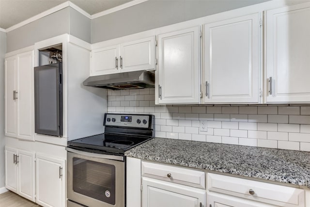 kitchen with ornamental molding, electric range, white cabinets, and light stone countertops