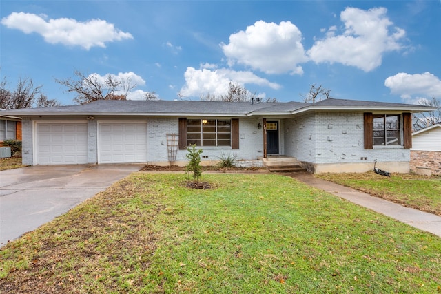 ranch-style house featuring a garage and a front yard