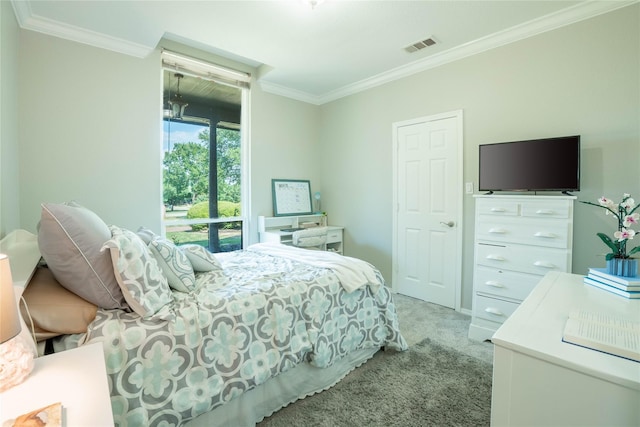 bedroom with light carpet, crown molding, and visible vents