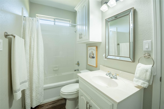 full bath with shower / tub combo with curtain, vanity, toilet, and wood finished floors