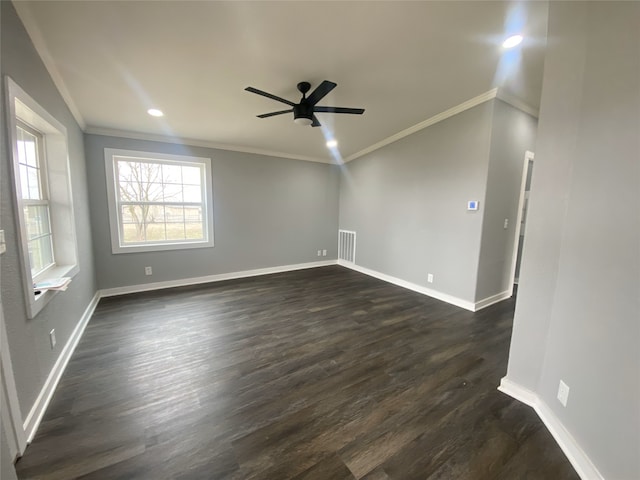 207 County Road 2005, Corsicana, TX 75110 - unfurnished room with ornamental molding, dark wood-type flooring, and ceiling fan