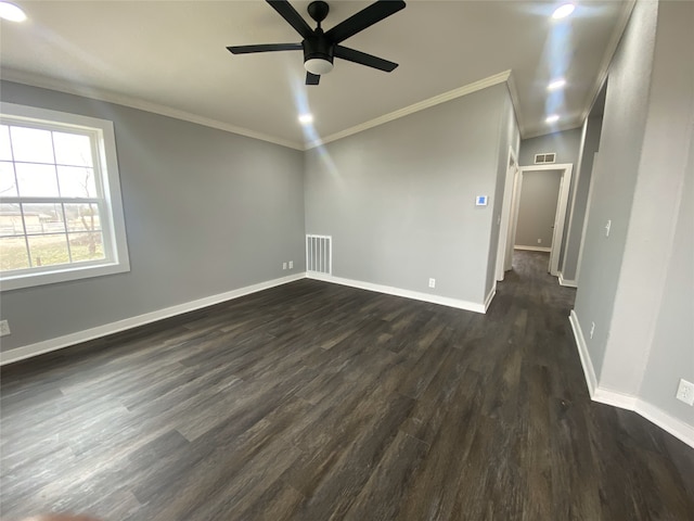 207 County Road 2005, Corsicana, TX 75110 - unfurnished room with ceiling fan, crown molding, and dark hardwood / wood-style flooring