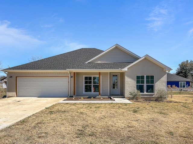 single story home featuring a front yard and a garage