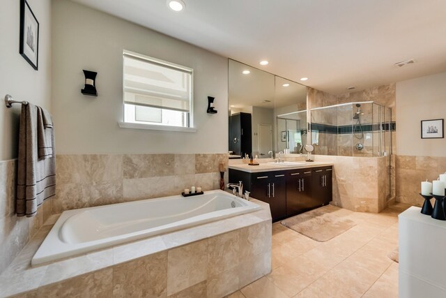 2123 Albany St, Dallas, TX 75201 - bathroom with plus walk in shower, vanity, and tile patterned flooring