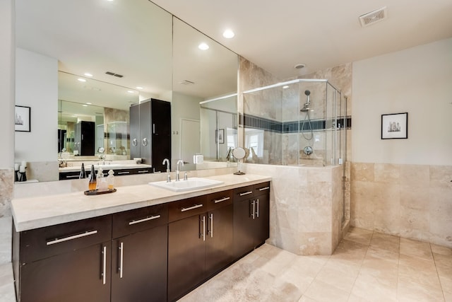 2123 Albany St, Dallas, TX 75201 - bathroom with a shower with shower door, vanity, and tile patterned flooring