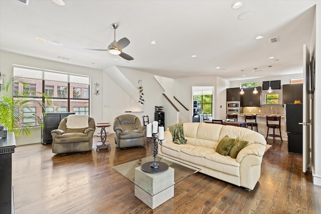 2123 Albany St, Dallas, TX 75201 - living room with ceiling fan, dark hardwood / wood-style flooring, and sink