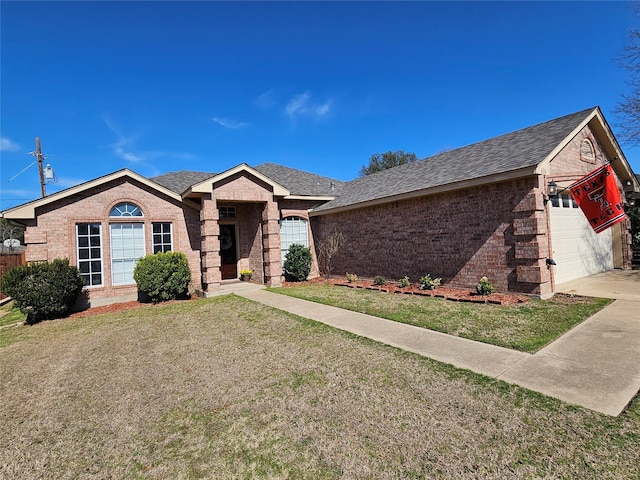 ranch-style home with a garage and a front yard