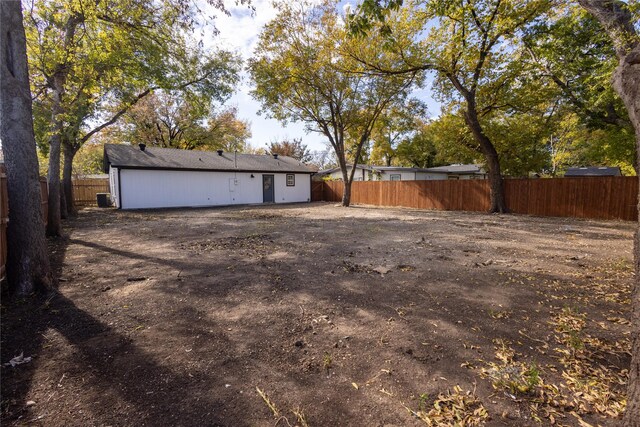 garage with fence