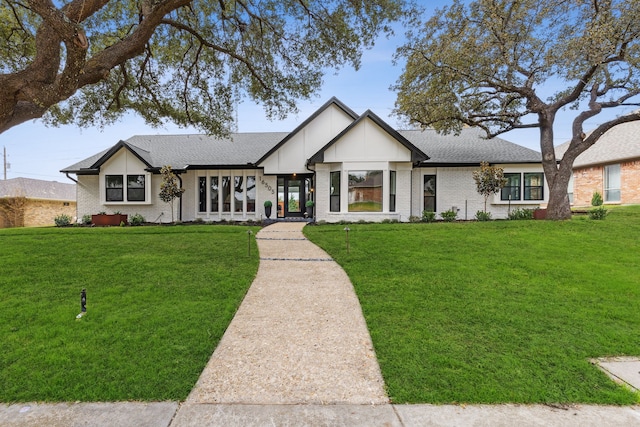 view of front of home with a front yard