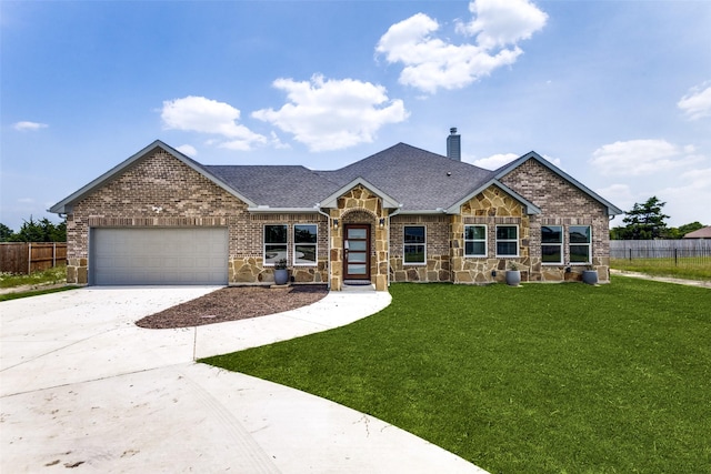 craftsman-style home with a front lawn and a garage