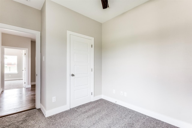 unfurnished bedroom with carpet floors