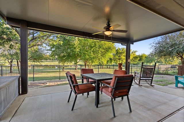 view of patio featuring ceiling fan