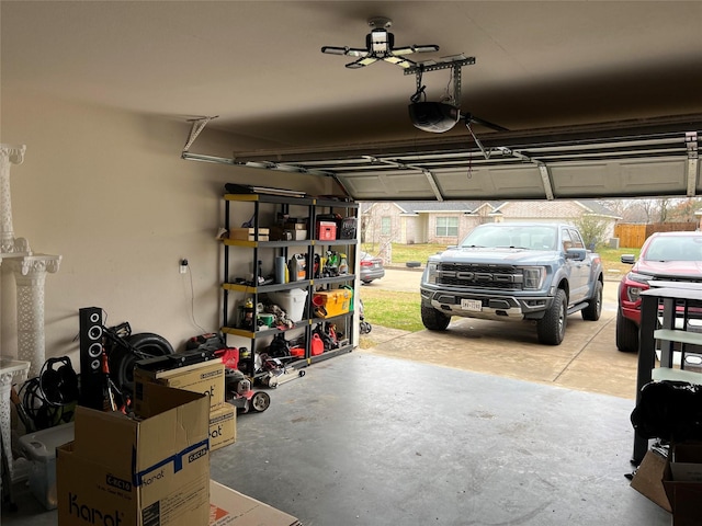 garage featuring a garage door opener