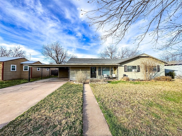 single story home with a carport and a front yard