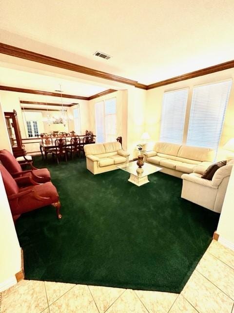 living room with carpet floors and crown molding