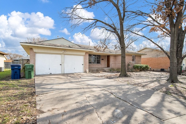 single story home featuring a garage