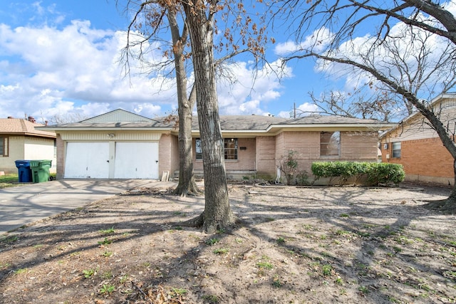 single story home with a garage