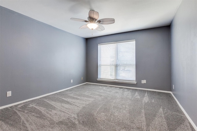 unfurnished room with carpet and ceiling fan