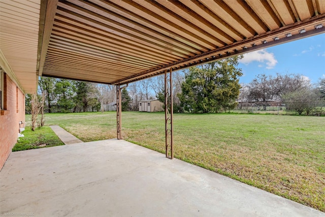 view of patio / terrace with a storage shed