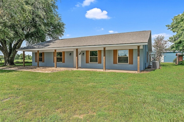 single story home featuring central AC and a front lawn