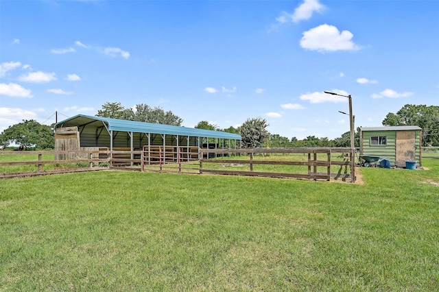 view of horse barn featuring a rural view