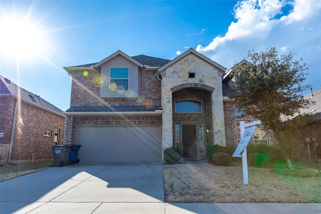 view of front of property featuring a garage