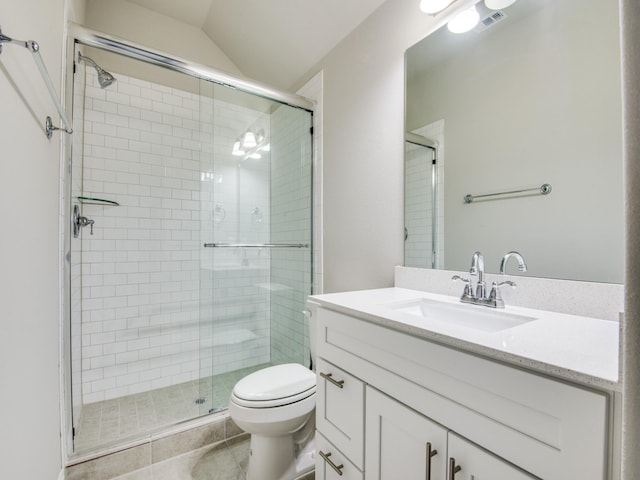 bathroom with lofted ceiling, vanity, an enclosed shower, tile patterned flooring, and toilet