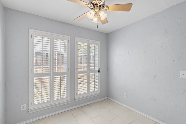 spare room featuring ceiling fan