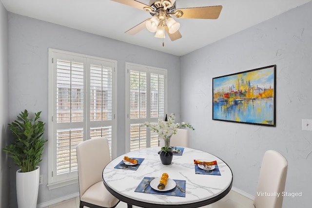 dining area featuring ceiling fan