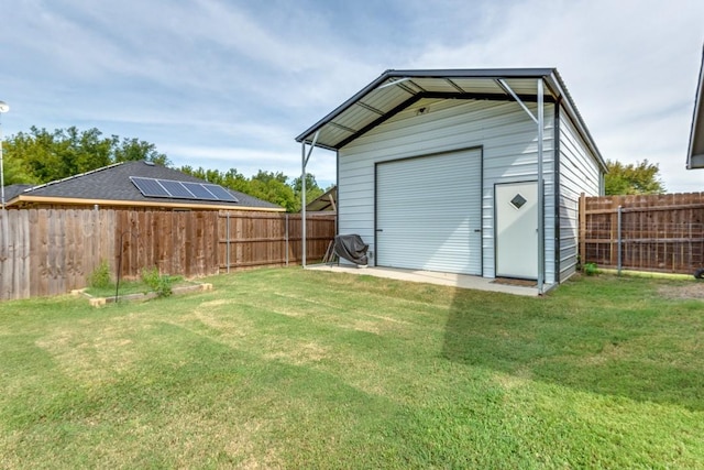 view of outbuilding with a lawn