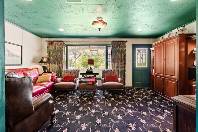 sitting room featuring carpet