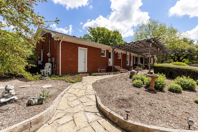 view of front of house with a pergola