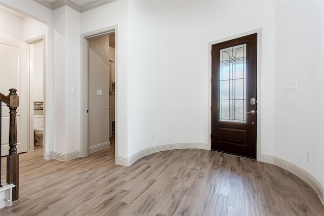 foyer entrance with light wood-type flooring