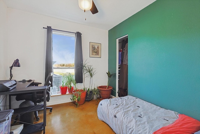 bedroom featuring concrete flooring and ceiling fan