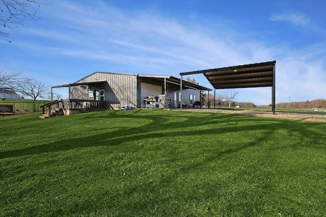 view of yard with a carport