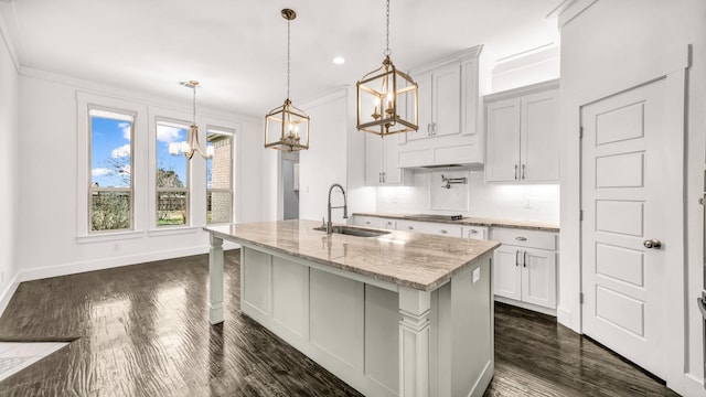 114 N Star Crossing Ln, Weatherford, TX 76088 - kitchen featuring an island with sink, a sink, a chandelier, decorative backsplash, and black electric stovetop