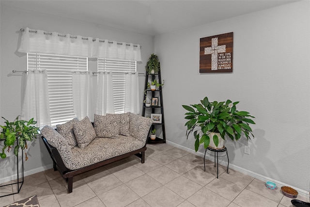 living area featuring light tile patterned floors