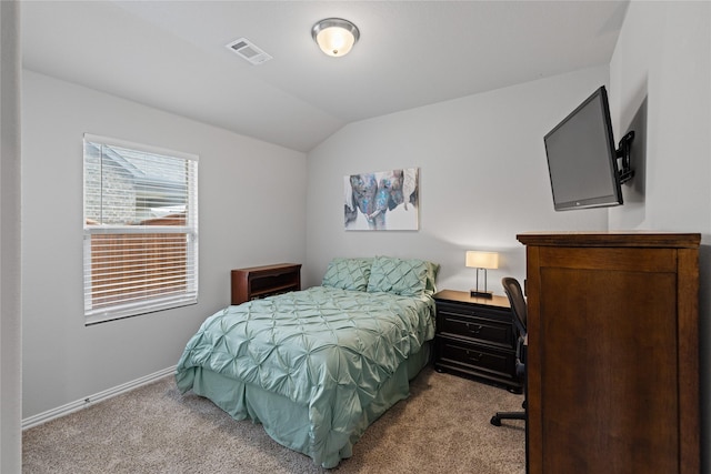 bedroom with light carpet and vaulted ceiling