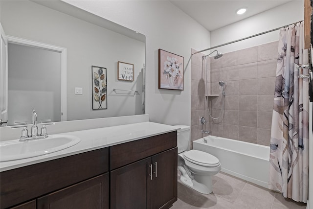 full bathroom with toilet, shower / bath combo, tile patterned flooring, and vanity