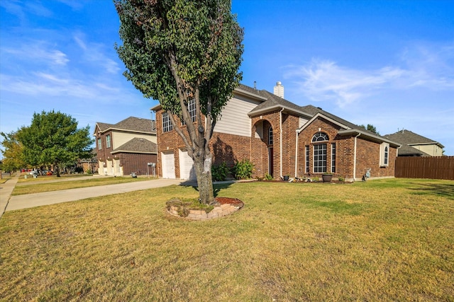 front facade with a front yard and a garage