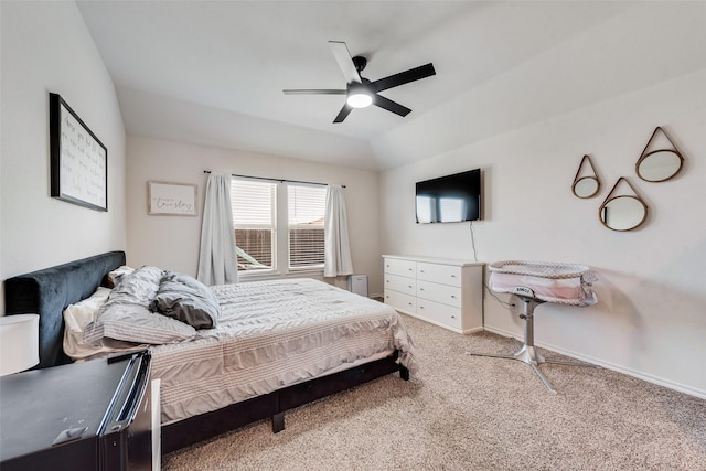 bedroom featuring carpet, lofted ceiling, and ceiling fan