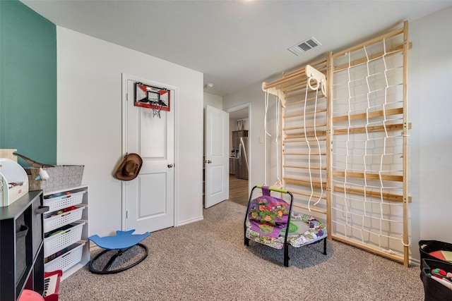 recreation room featuring carpet