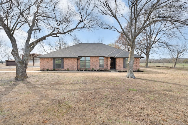 view of front of home featuring a front yard