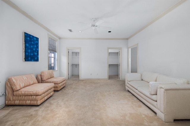 living room with light carpet, ceiling fan, and crown molding